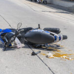 Motorcycle accident scene with emergency response