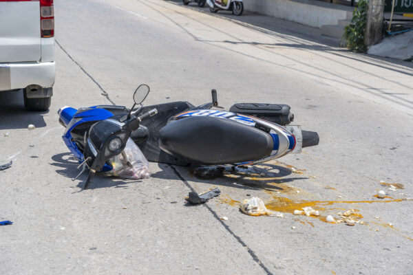 Motorcycle accident scene with emergency response