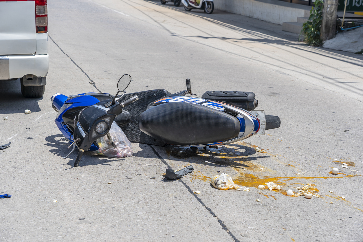 Motorcycle accident scene with emergency response